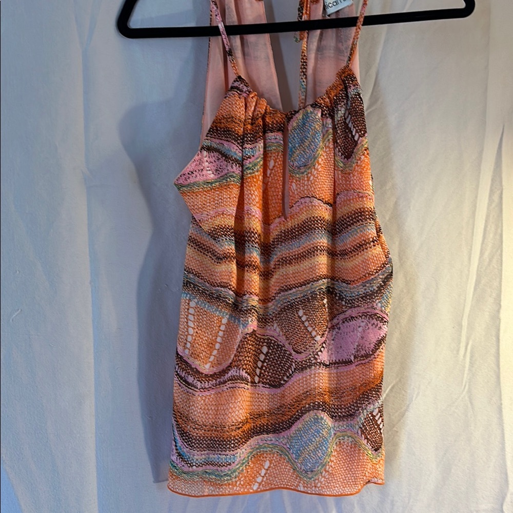 Veronicam Size XS. Colorful Patterned Sleeveless Blouse that ties in the back.